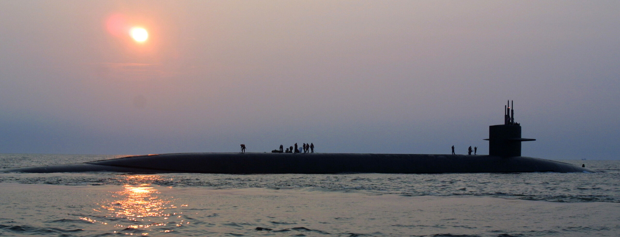 Large Military Submarine Poking Out of the Water